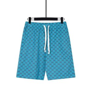 Pantalón corto azul con logo Gucci