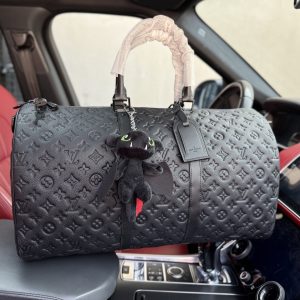 Bolsa de viaje Louis Vuitton Muñeco