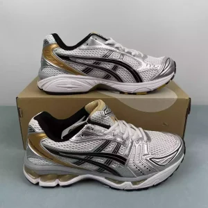 Asics GEL Kayano-14 doradas