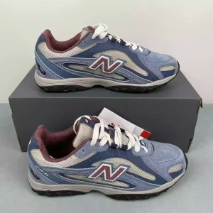NEW BALANCE 204L azul rojo
